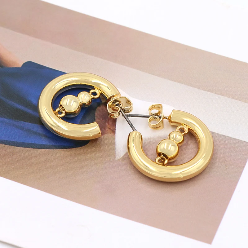 Brincos de cabodos em forma de bronze banhados a ouro