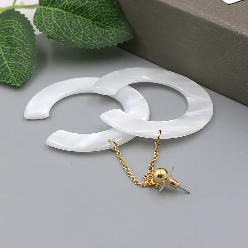 Luar Brincos em forma de C White White