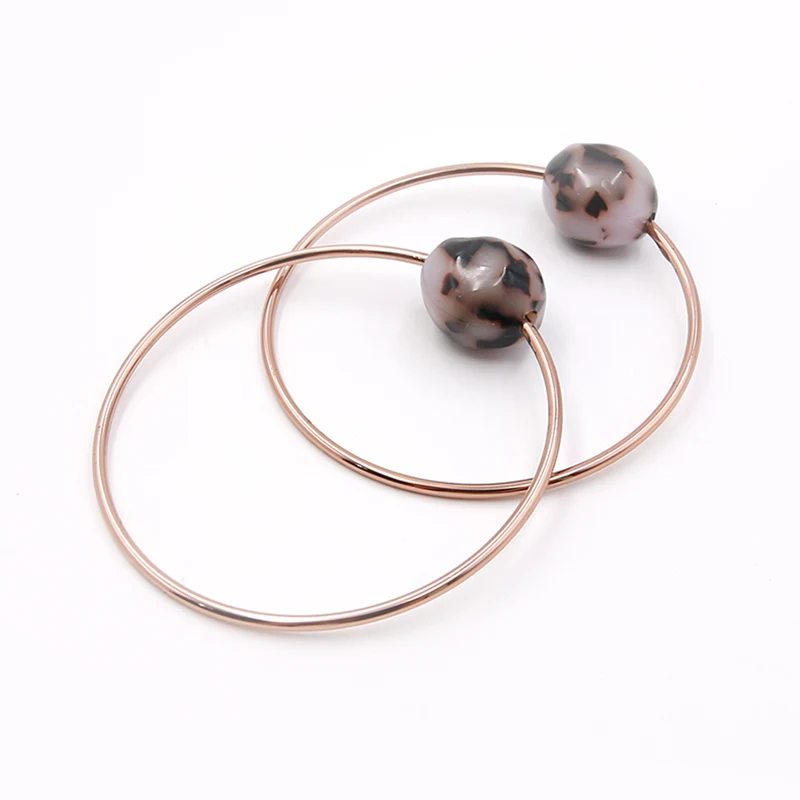 Pulseira de argola infinito em tons de ouro rosa